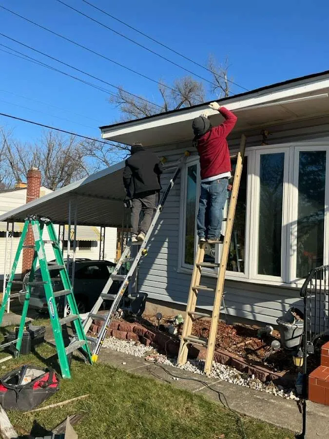 Restoration crew performing exterior repair in Angleton